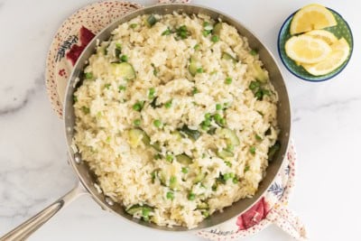 Risotto rice in frying pan.