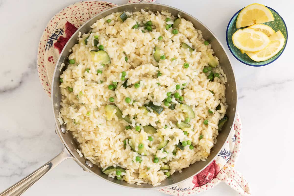 Risotto rice in frying pan. 