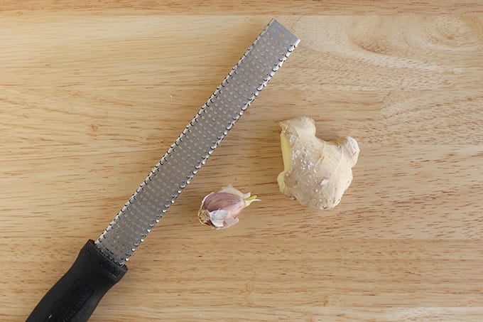 Garlic and ginger on counter for sesame green beans.