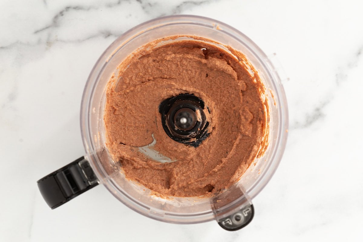 Beet hummus in food processor.