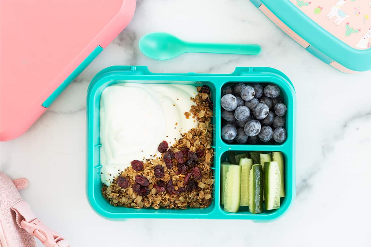 yogurt and granola lunchbox idea on counter.