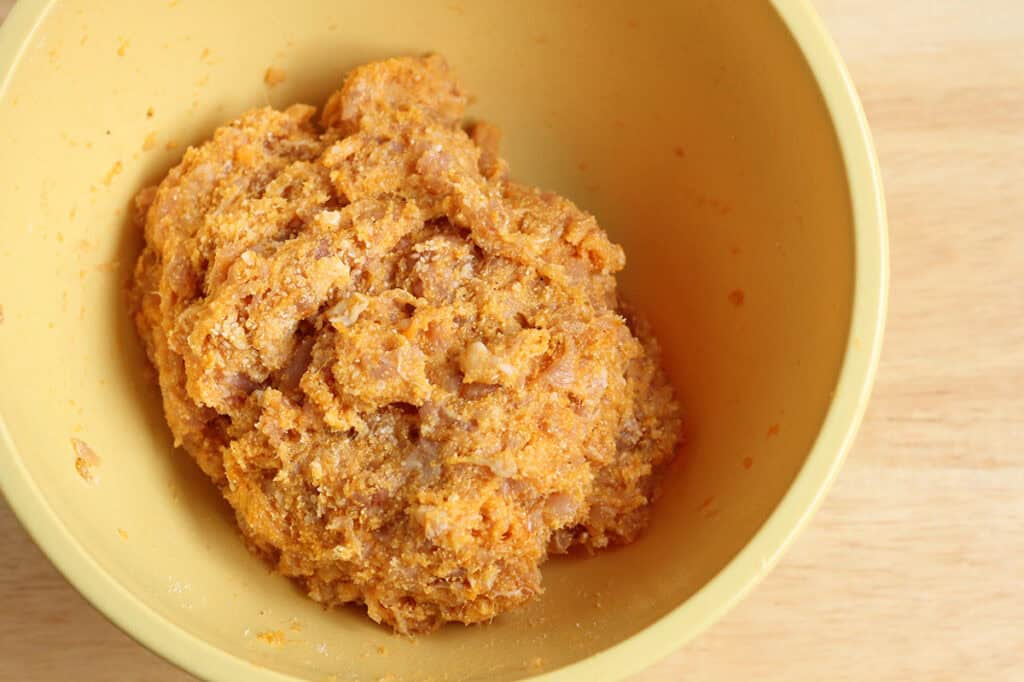 batter for healthy chicken meatballs in bowl.