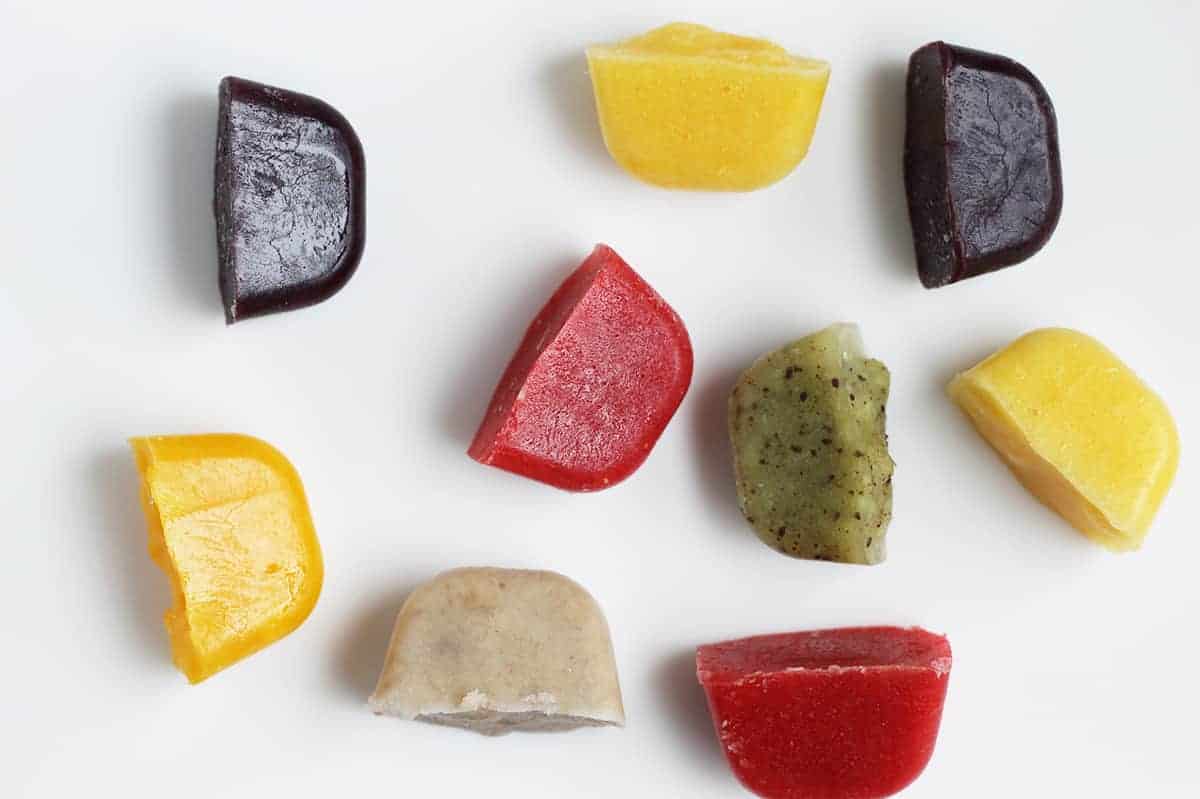 https://www.yummytoddlerfood.com/wp-content/uploads/2019/11/baby-food-frozen-cubes-on-counter.jpg