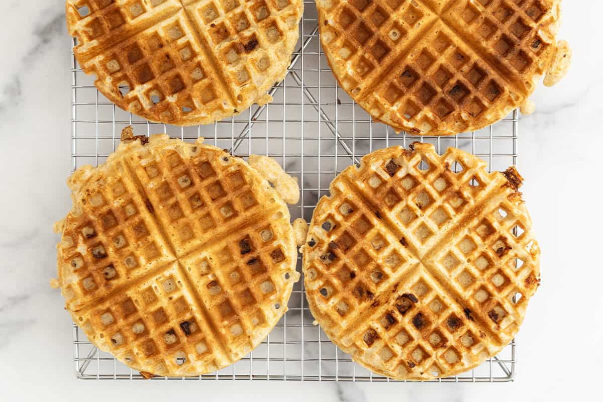 Whole wheat waffles on cooling rack.