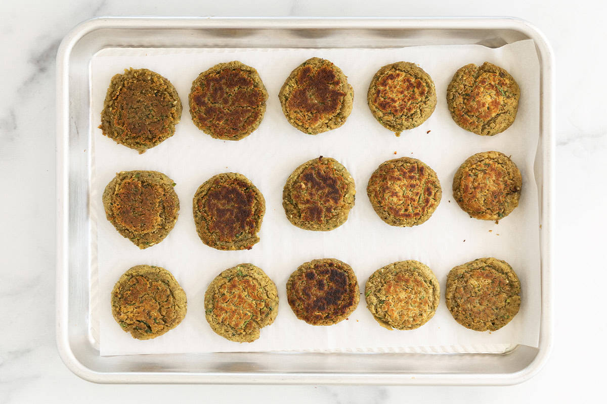 Lentil falafel on baking sheet.