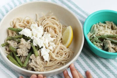 spaghetti with sausage in bowl