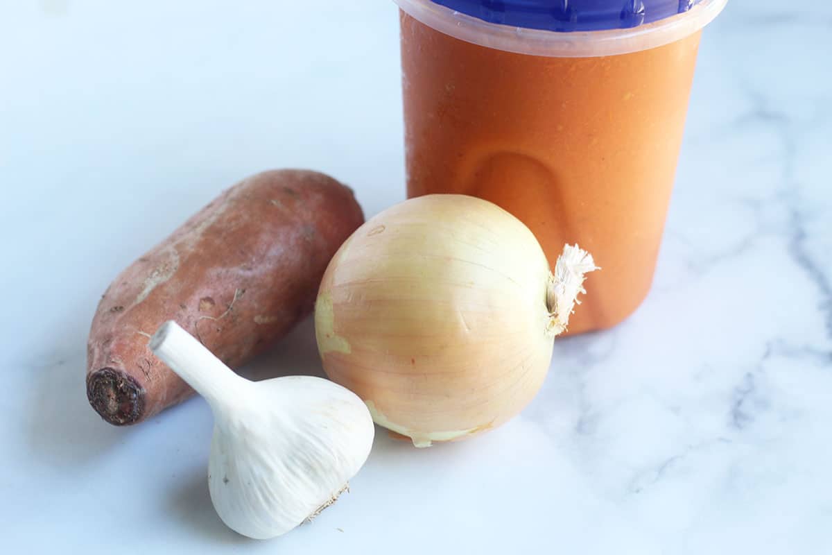 ingredients in vegan tomato soup on counter.