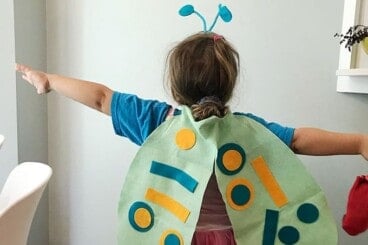 https://www.yummytoddlerfood.com/wp-content/uploads/2020/09/toddler-wearing-craft-kit-project-368x245.jpg