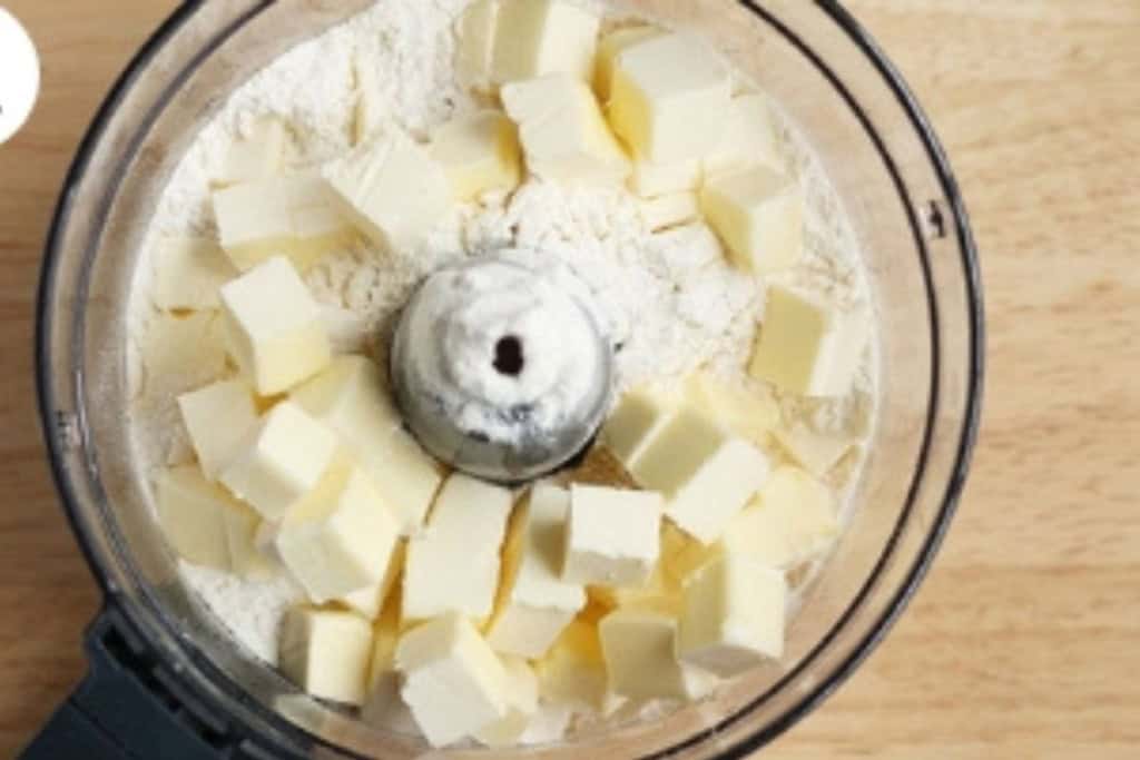Butter and flour in food processor for pie crust.