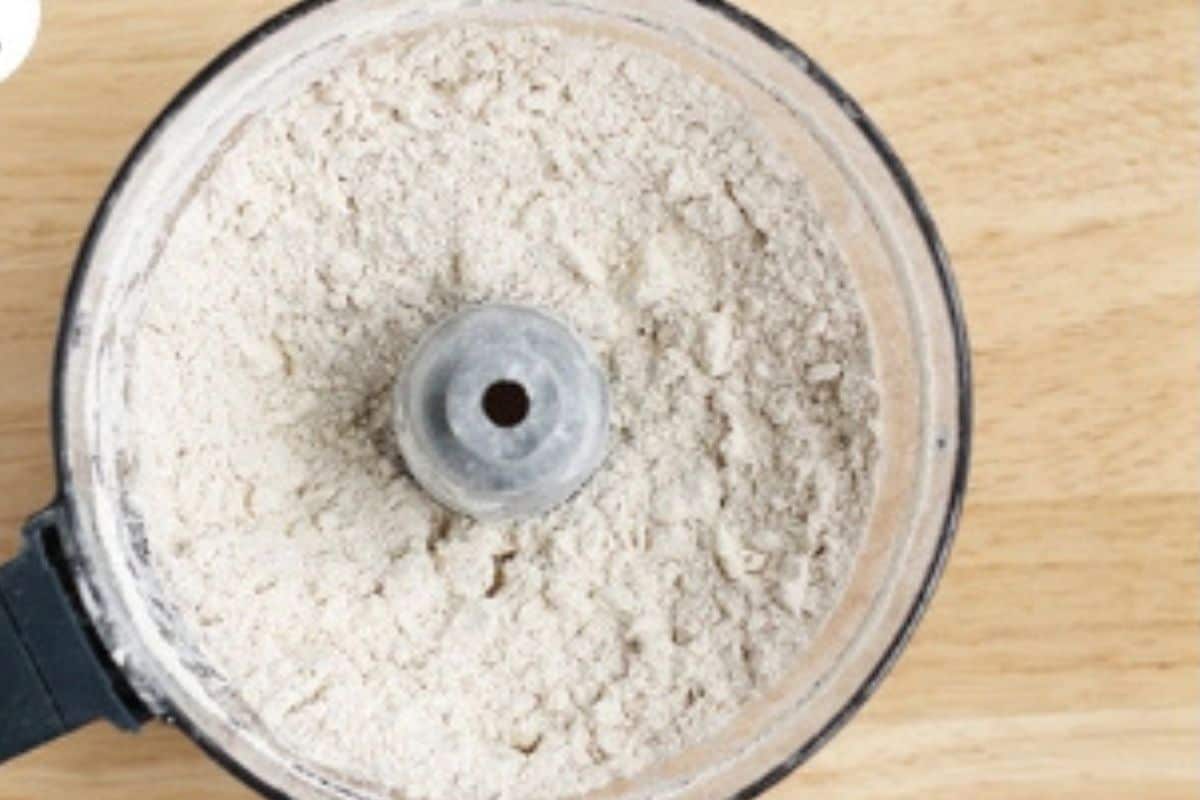 Flour blended with butter in food processor for pie crust.