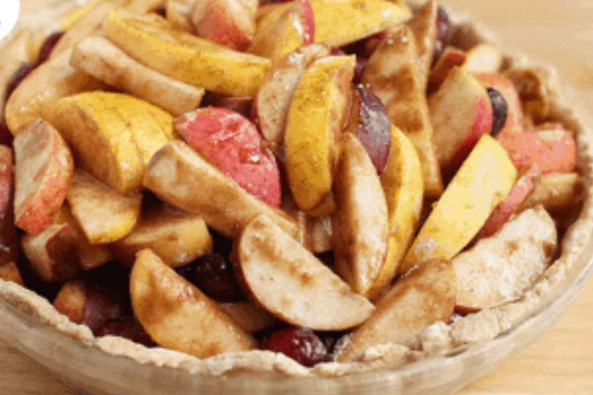 Cranberry apple pie in pie pan before adding top crust.