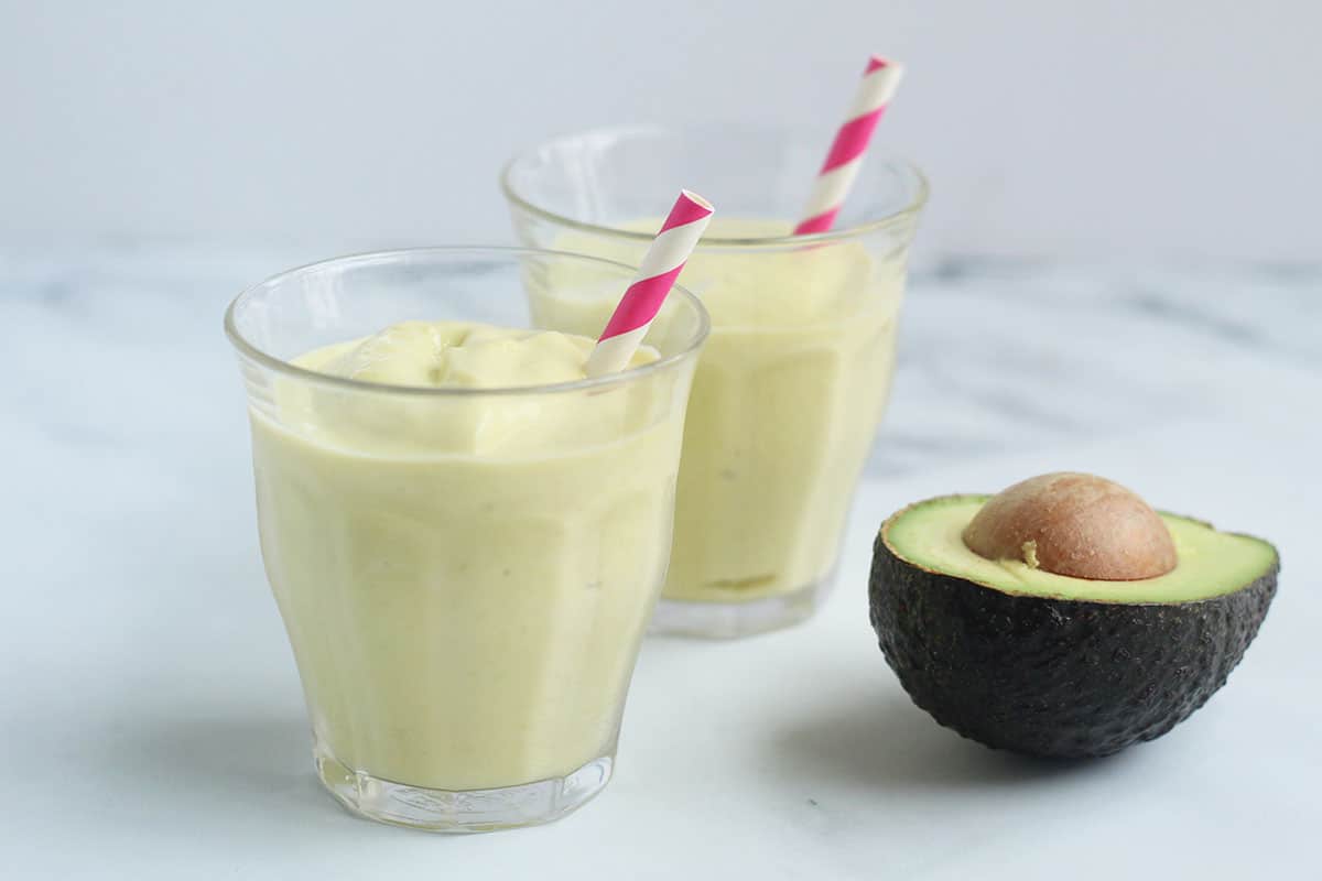 avocado mango smoothie on counter.