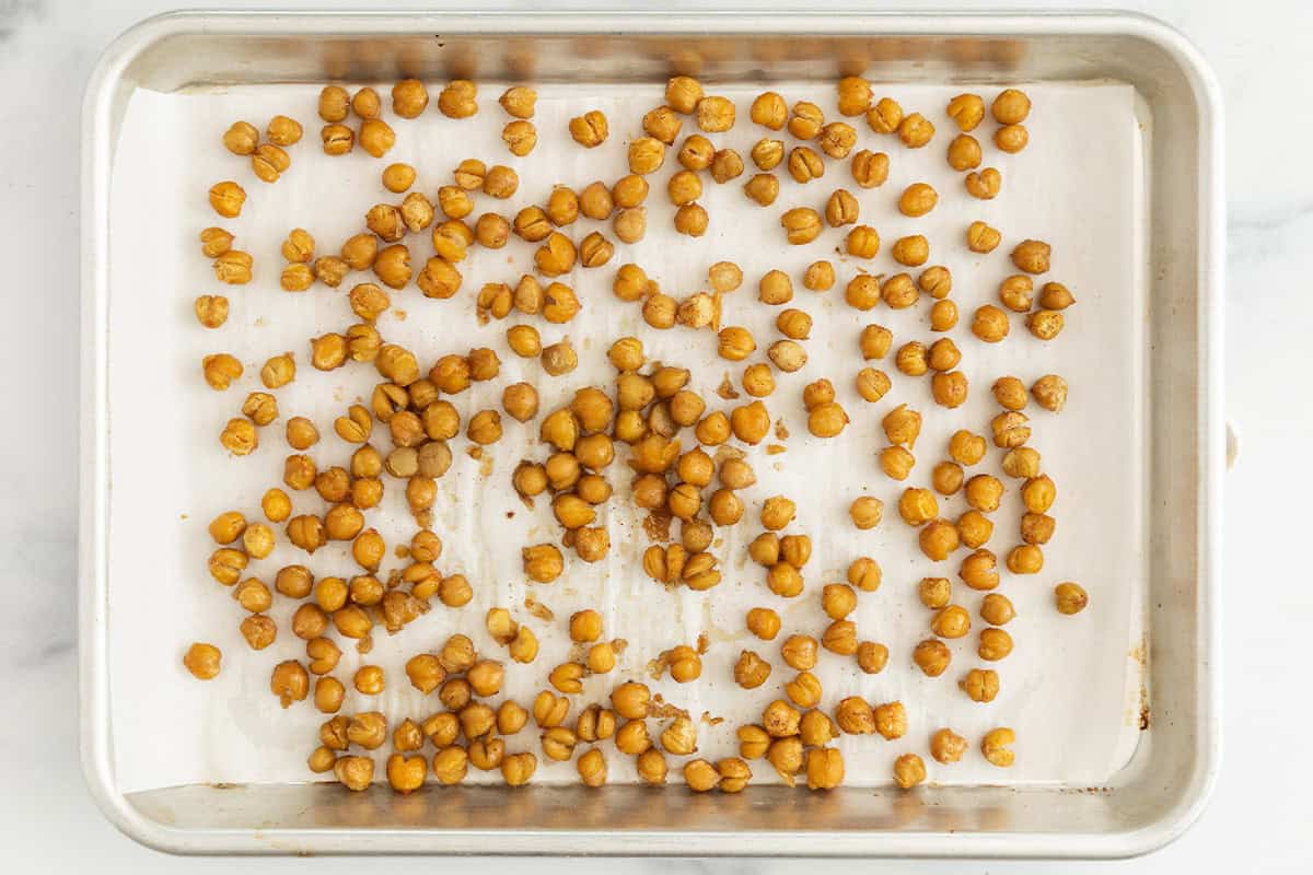 Chickpeas on baking pan after baking.