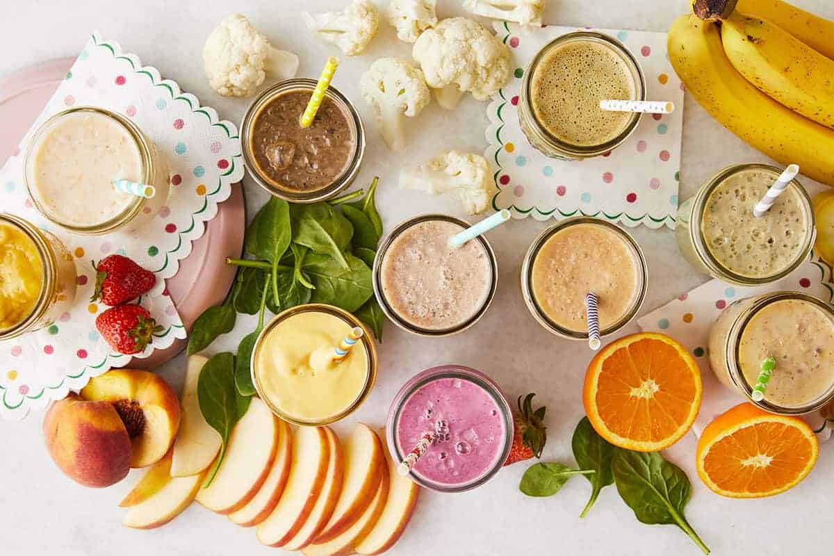 https://www.yummytoddlerfood.com/wp-content/uploads/2021/02/toddler-smoothies-on-counter-with-produce.jpg