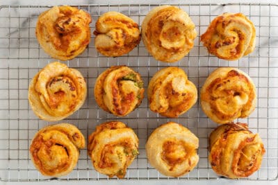 pizza rolls recipe on wire rack on counter.