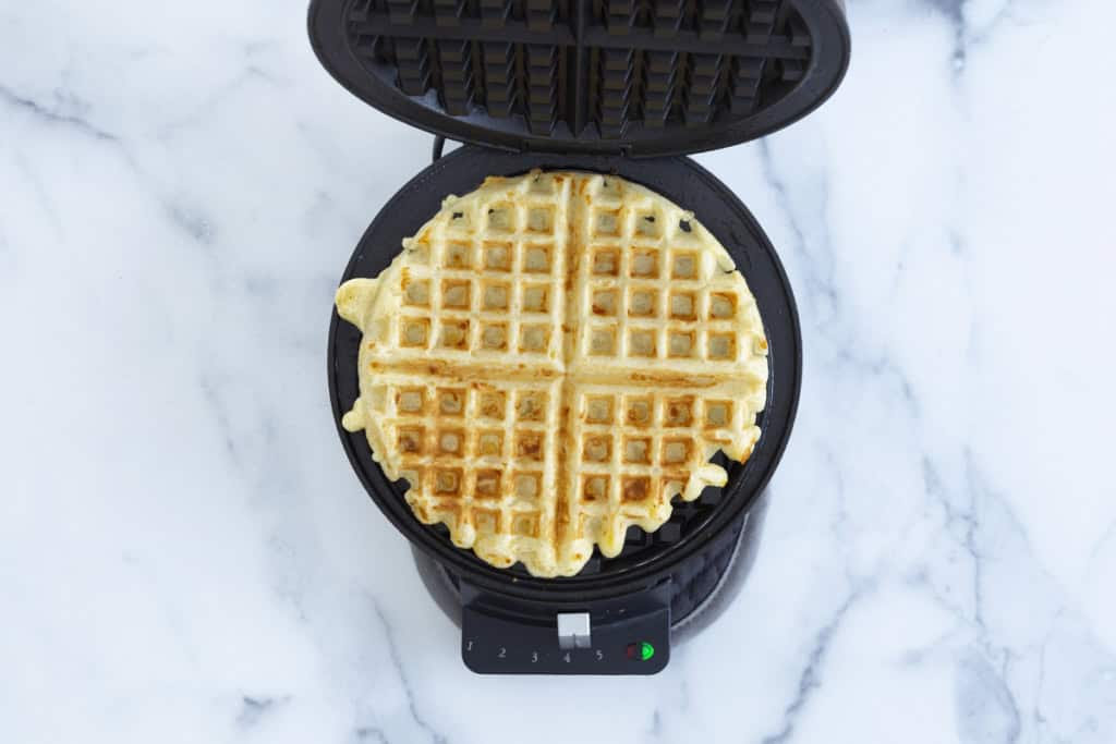 Waffle in waffle iron after cooking. 