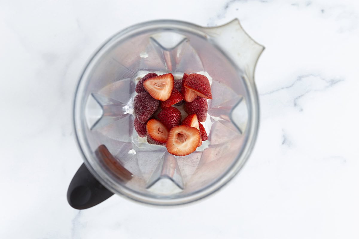 Strawberries in blender for strawberry smoothie. 