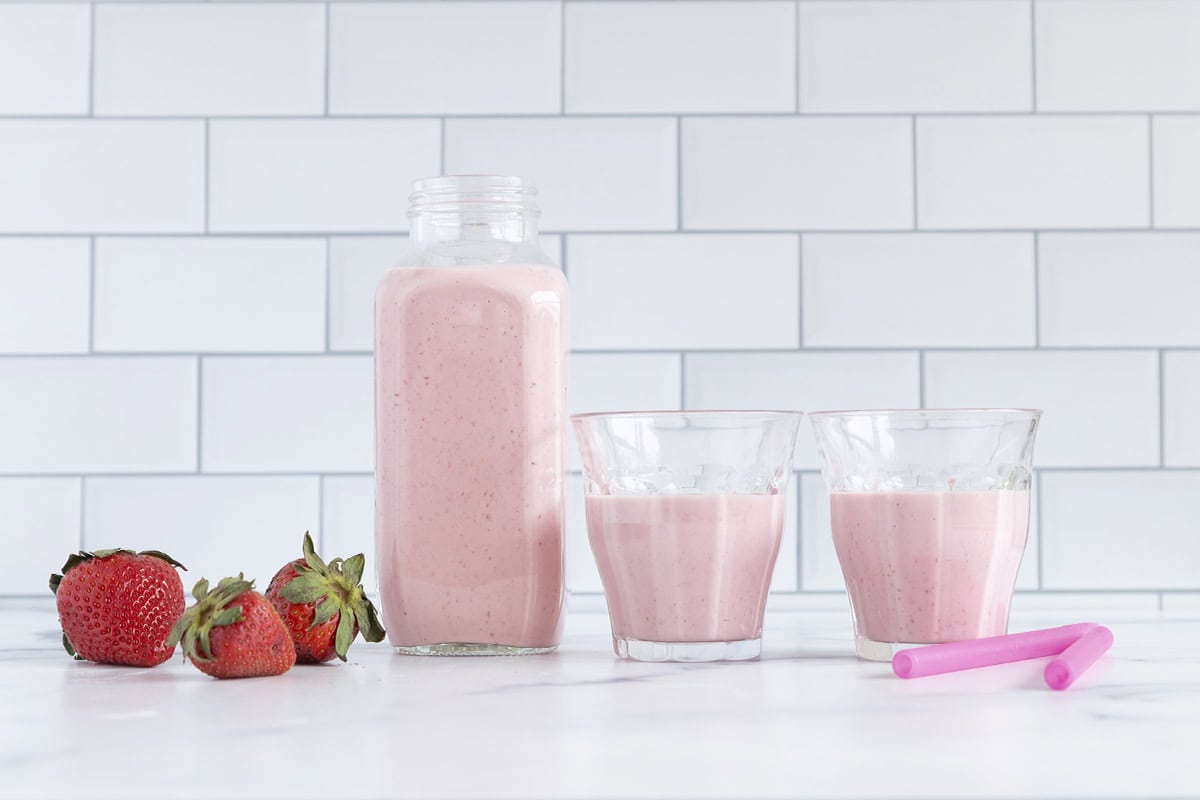 Strawberry smoothie in three glasses.