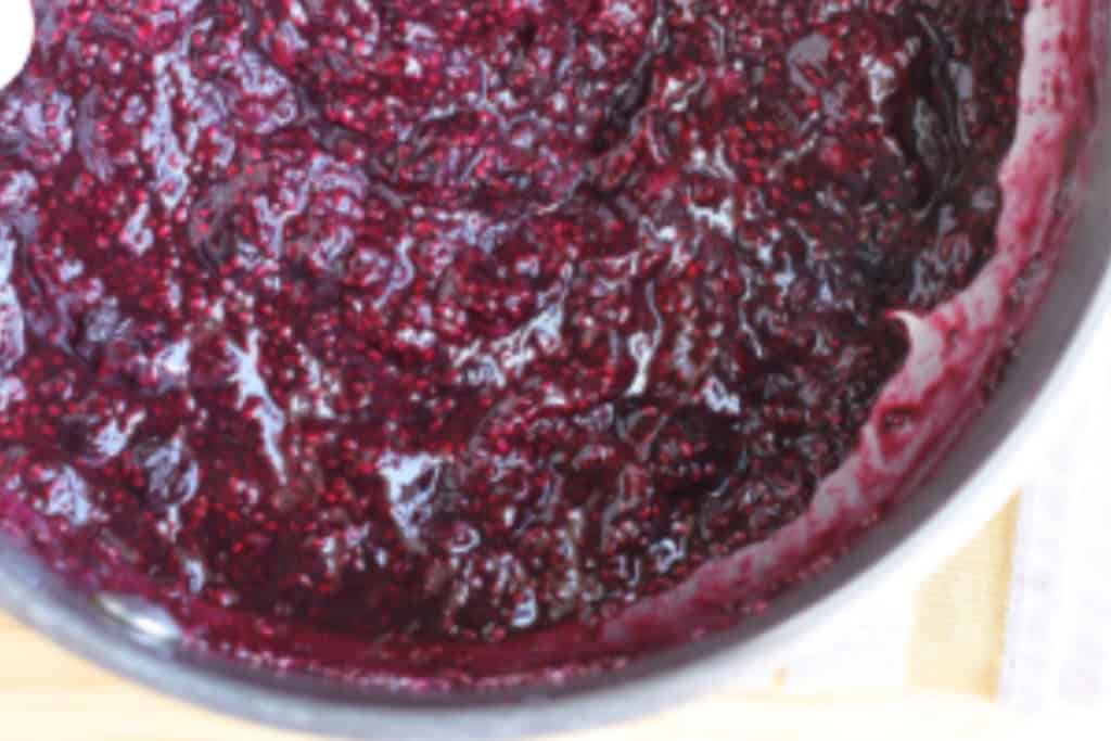 Blueberry chia seed jam in pan after cooking.