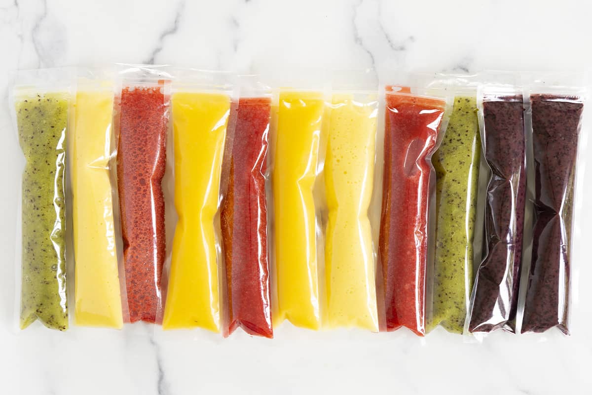 ice pops in various flavors on marble countertop