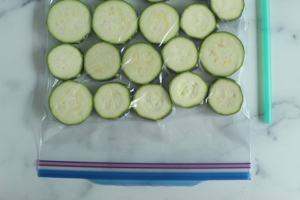 Zucchini slices in plastic zip top bag.