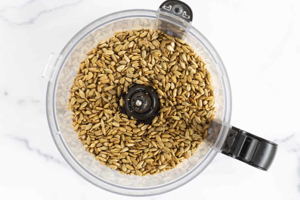 Sunflower seeds in food processor for sunflower seed butter.