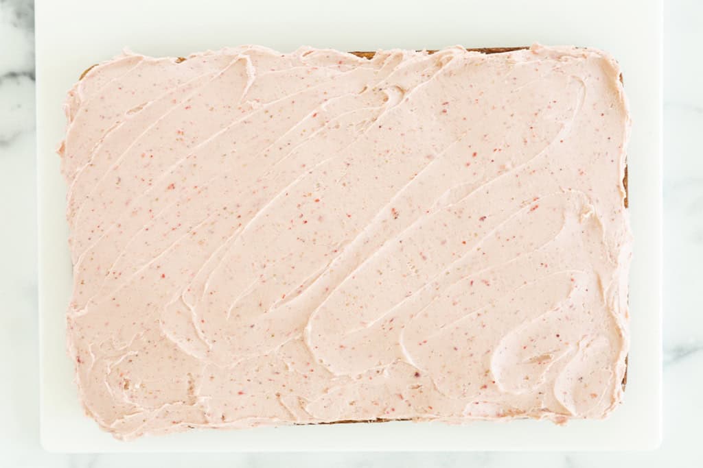Frosted strawberry sheet cake.
