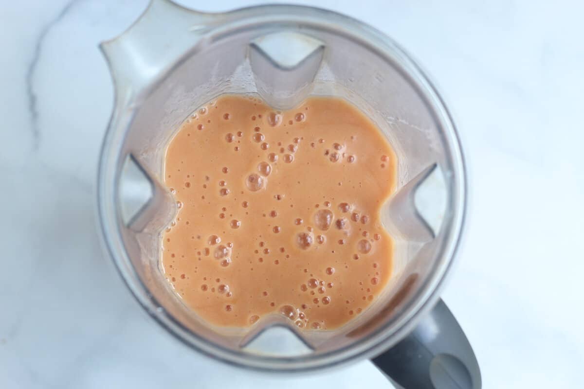 Peach sauce in blender after blending.