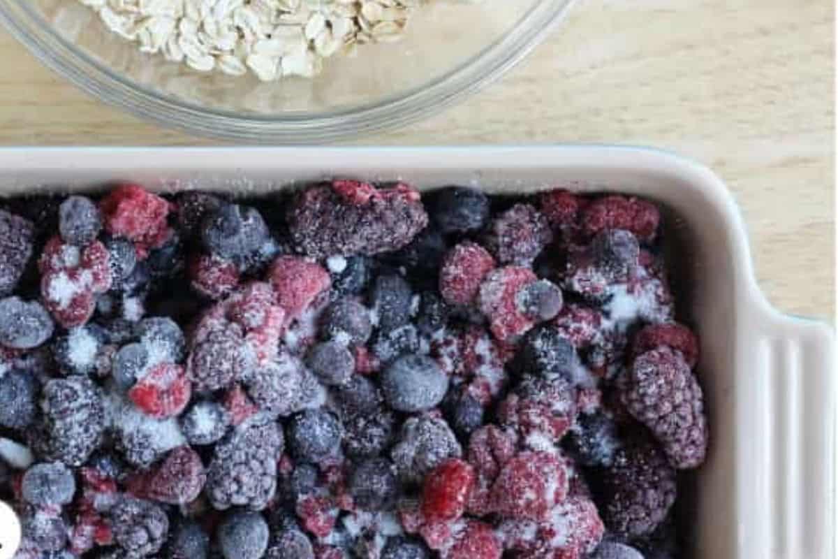 Frozen berries in baking pan for berry crisp. 