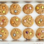 Monster cookies on cookie sheet after baking.