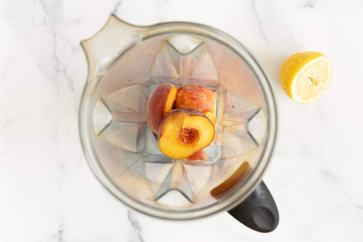 Peach halves in blender for peach yogurt. 