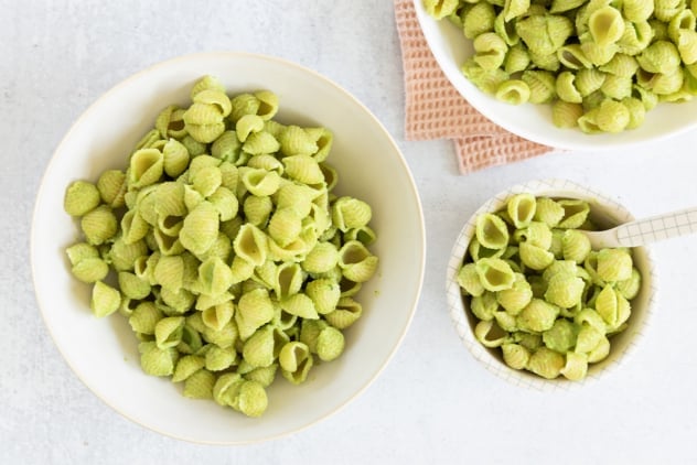 Broccoli pasta in various bowls.