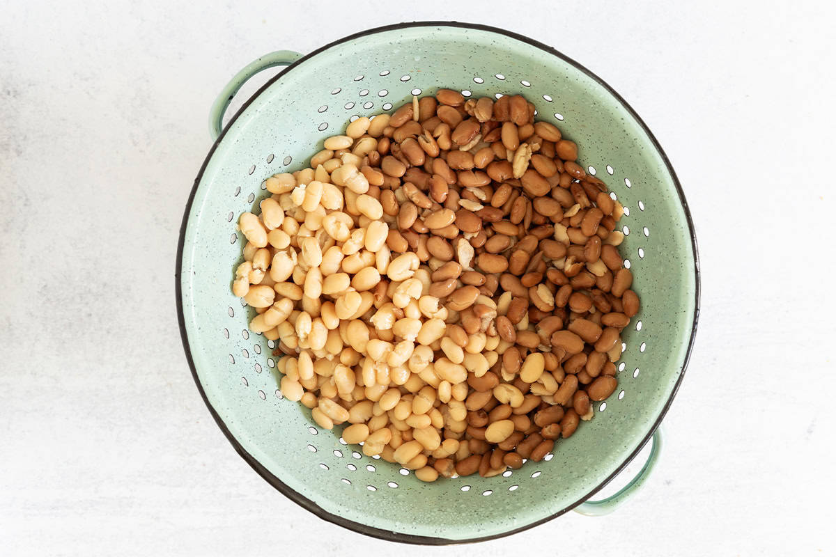 Beans in strainer for white turkey chili.