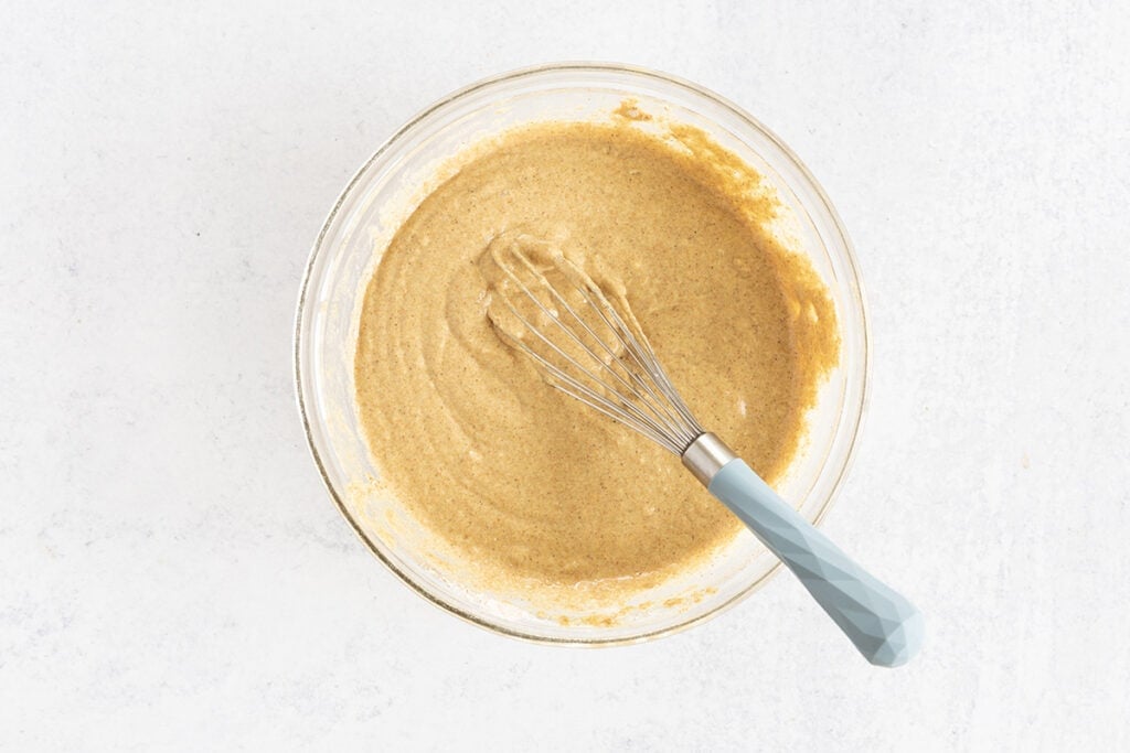 gingerbread pancakes batter in mixing bowl.