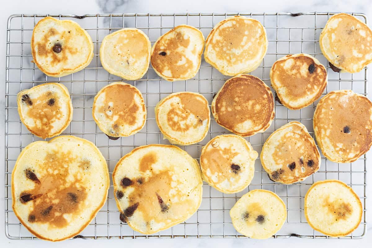 chocolate chip pancakes on rack.