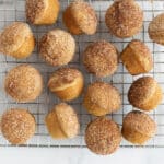 donut muffins cooling on wire rack.