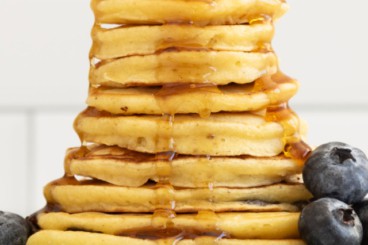 Favorite pancakes for kids, stack of pancakes with syrup.