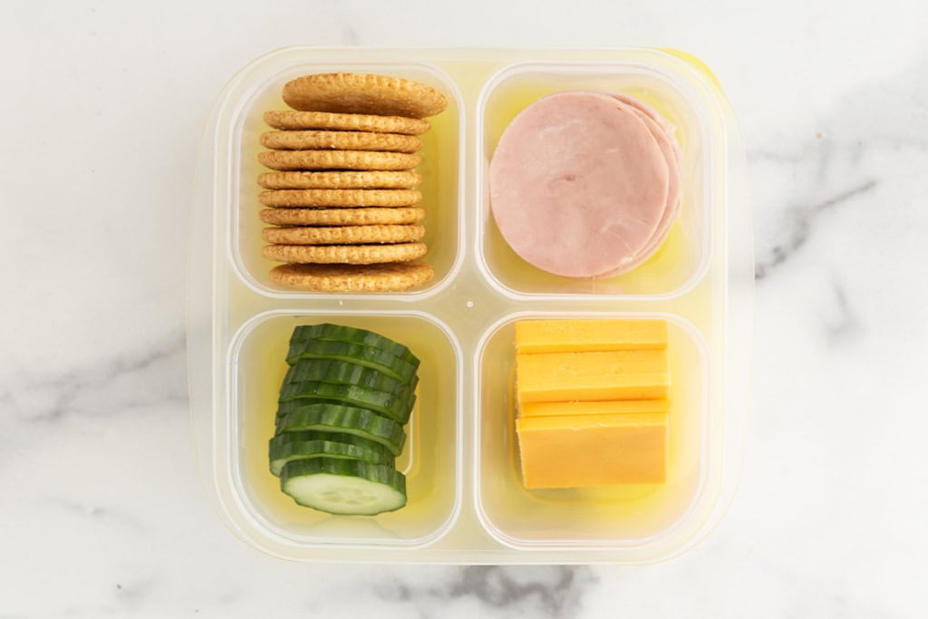 Homemade lunchable with ham, cheese and crackers.