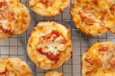 Pizza cups on cooling rack.