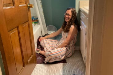 woman on bathroom floor.