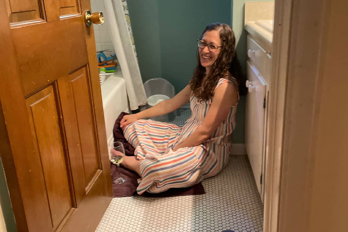 amy on bathroom floor.