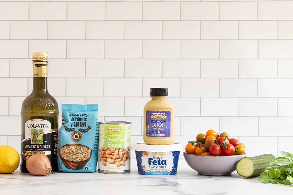 Ingredients for farro salad on countertop.