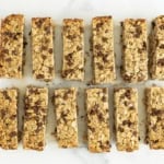 Healthy granola bars cut into bars on countertop.