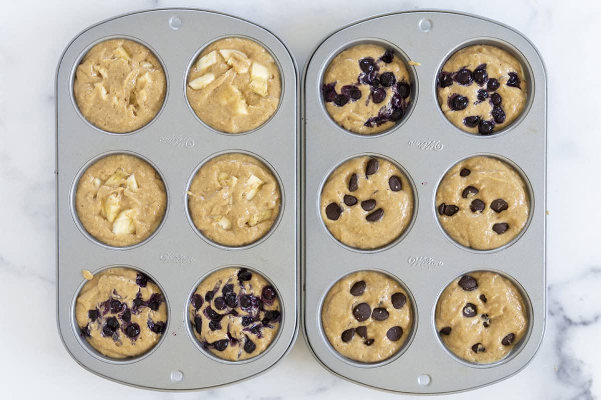 Peanut butter muffins in muffin pan before baking.