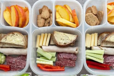 kids charcuterie lunch in lunch boxes.