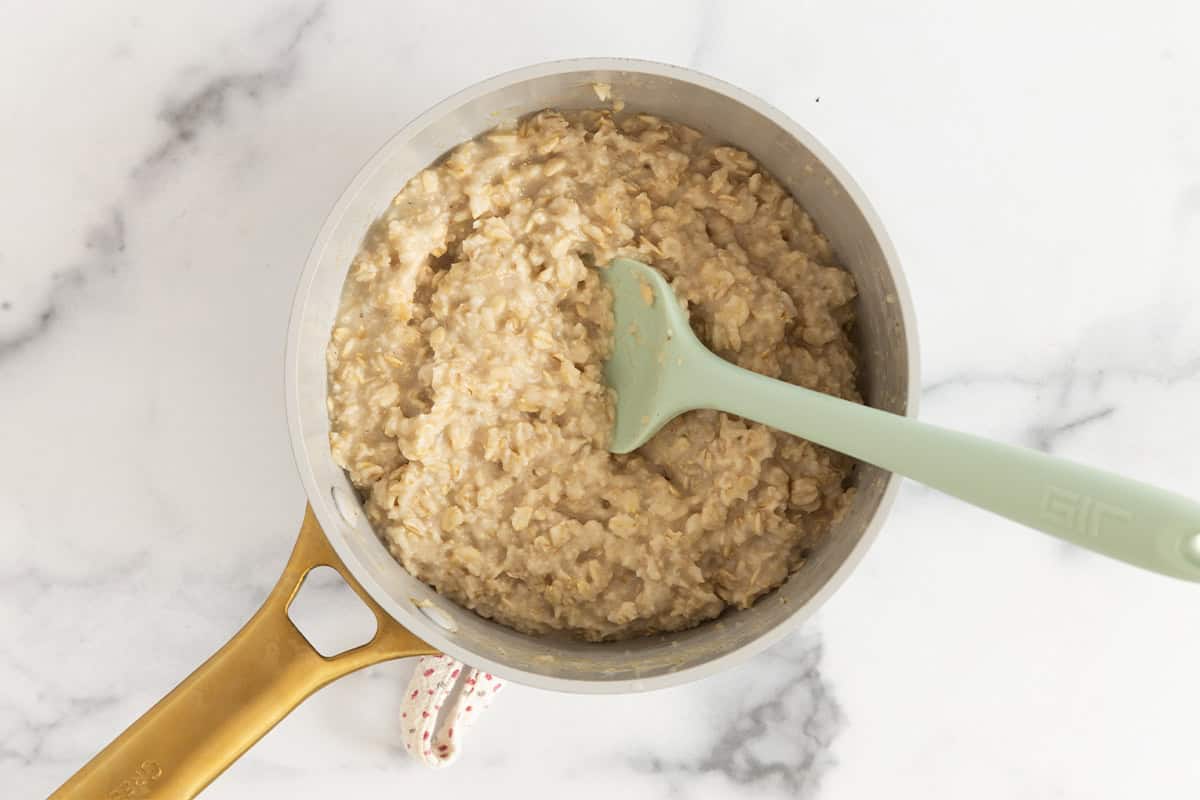 Oatmeal in pot for peaches and cream oatmeal.