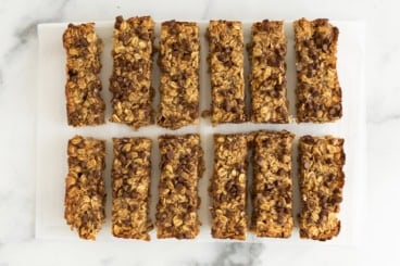 Peanut butter granola bars on parchment paper.