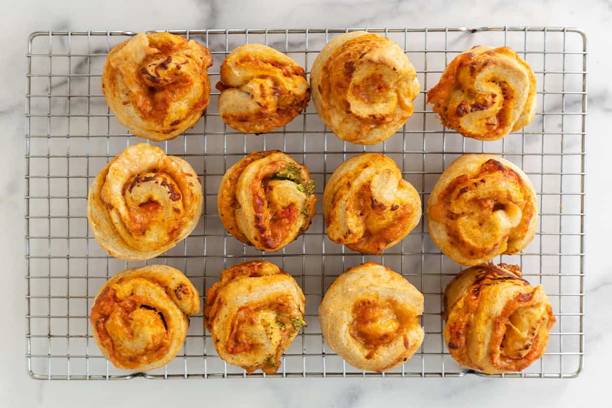 pizza rolls on wire rack.