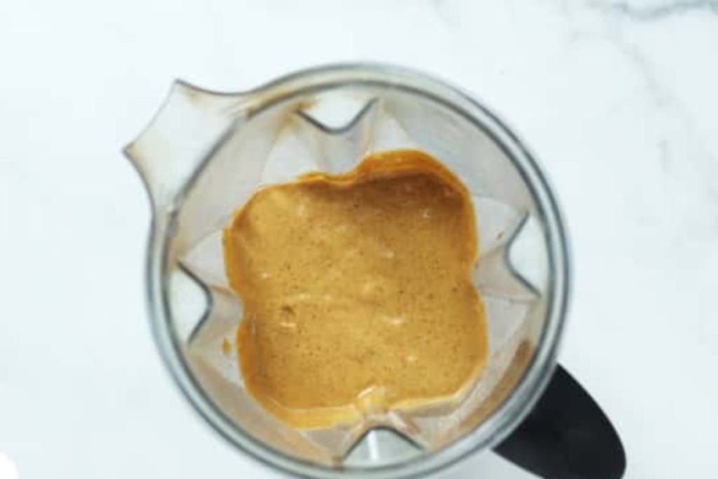 Batter for pumpkin muffins in blender.