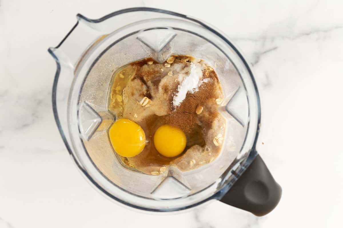 Ingredients in apple oatmeal muffins in blender before blending.